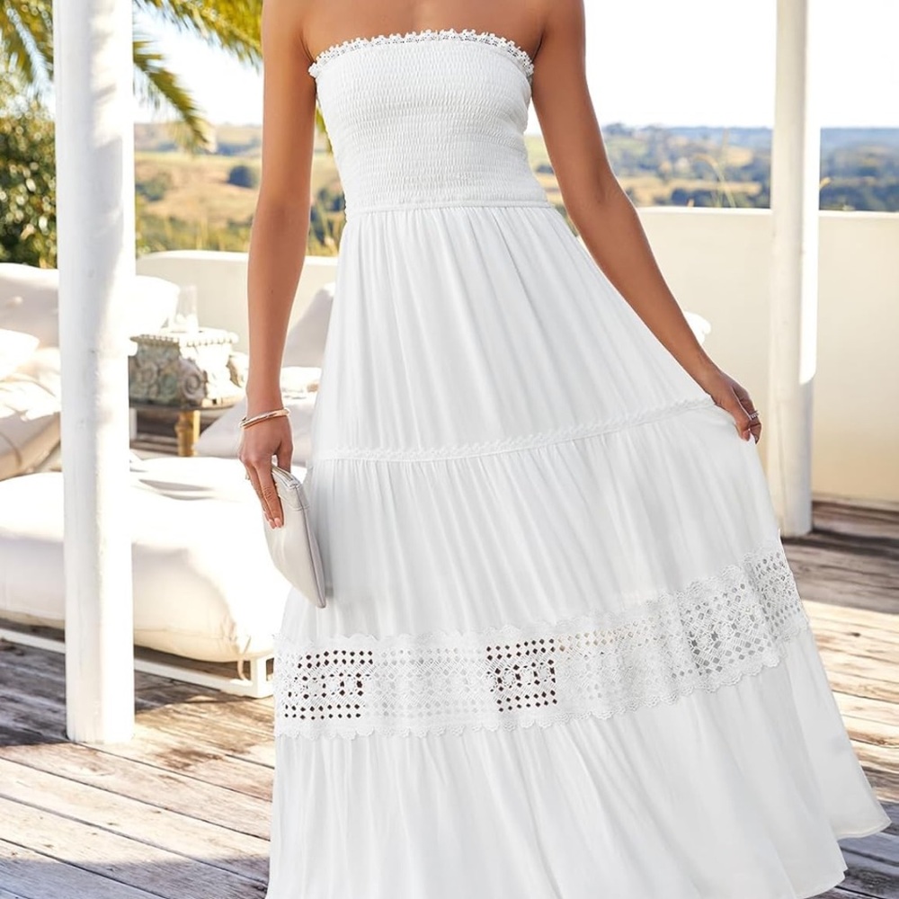 Chic White Strapless Dress with Flowing Design